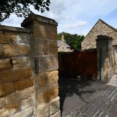 Front Wall And Gateways To The Hall And Hallsteads