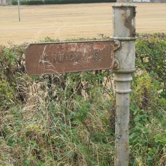 Guide Post On South Of Road Junction 300 Metres West Of Battle Bridge