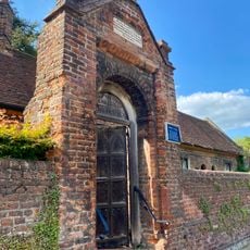 Forecourt Wall And Gateway To Pemberton Almshouses