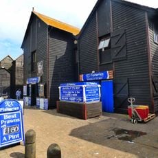 Net And Tackle Stores On Beach Including Groups L To W (consecutive)