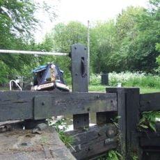 Marple Locks Number 8 and adjoining footbridge on Peak Forest Canal