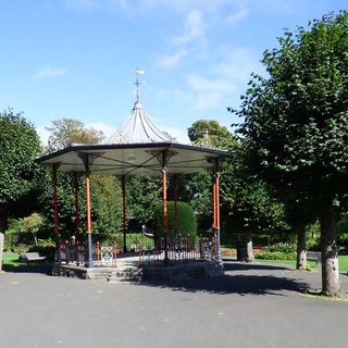 Bandstand In Public Gardens  Twelve Park Benches Surounding The Bandstand