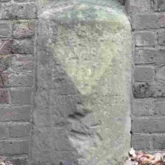 Milestone, Portsmouth Road, W of entrance to Claremont Park, 50m E of brow of hill before La Selva