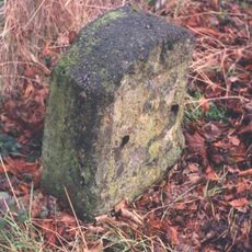Milestone, The Mythe; opp. N edge of Garden Centre & footpath