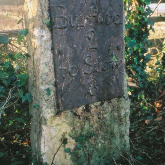 Milestone, 20m S of turning to lane for Hill Barn, 50m N of lay-by
