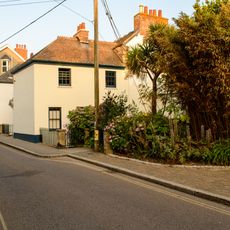 The Old Manor House Or Chy-an-eglos And Stables At Rear