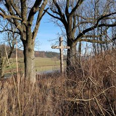 Kříž v pastvinách u Olešné