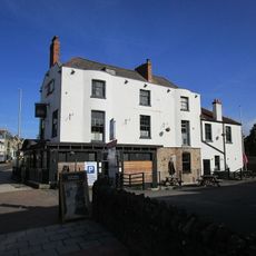 The White Lion Public House And Section Of Former Sea Wall To North End Of West Front