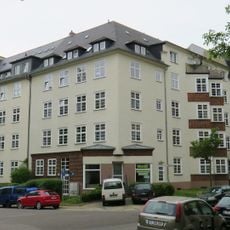 Mietshaus in geschlossener Bebauung in Ecklage Erich-Mühsam-Straße 18
