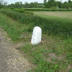 Milestone, roadside at TL51794033