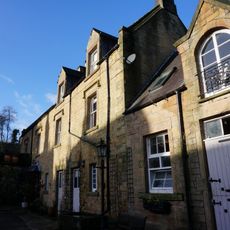 Haddon House Farmhouse with attached outbuildings and gateways