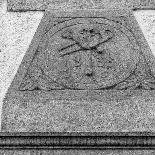 Former blacksmith's shop - door jambs and shield over lintel