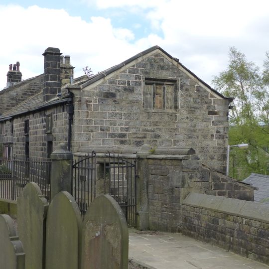 Walls, railings and gateway to Church of St Thomas a Becket
