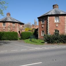 Pair Of Lodges To Stanbrook Abbey With Connecting Wall And Gatepiers
