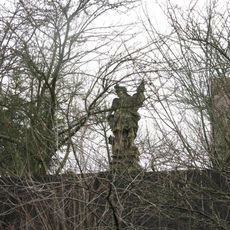 Socha svatého Floriána v zahradě domu 249 v Úštěku