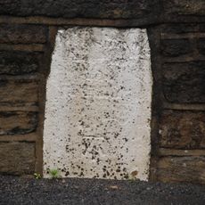 Boundary stone in eastern parapet of bridge at junction with Turbury Lane