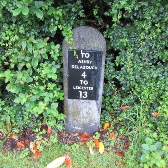Milestone outside Ravenstone Village Institute