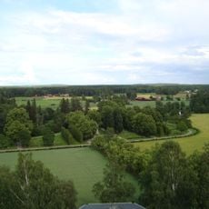 By new cemetery