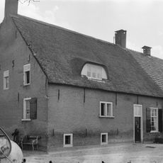 Boerderij van het brabantse langgeveltype met schuur van het vlaamse type