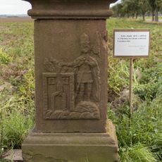 Kříž s reliéfem sv. Floriána