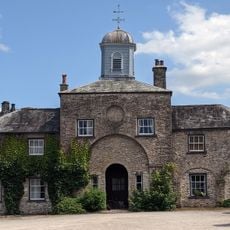 Stables and attached barn to south west of Sizergh Castle