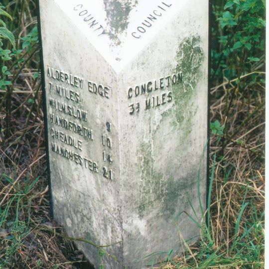 Milepost, S of Church