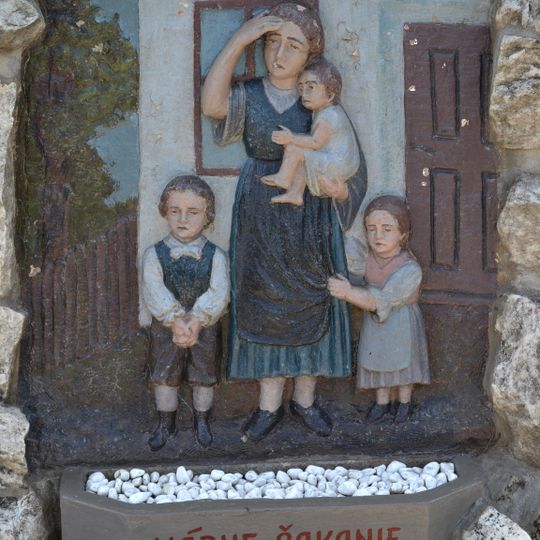 Pomník padlým v I. a II. sv. v. , reliéf figurálny III.