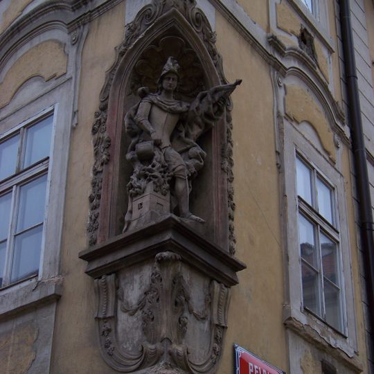 Socha svatého Floriana na nároží Nosticovy a Pelclovy ulice v Praze