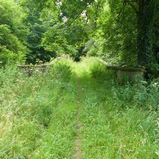 Bridge at the southern end of the former lake in the grounds of Rendcomb College
