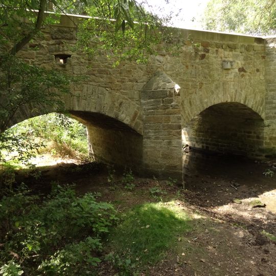 Stone bridge over the Výmola