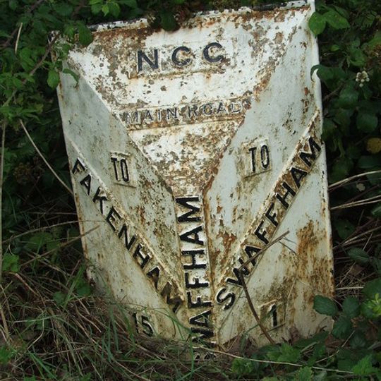 Milepost, Castle Acre Road, by Safeway store,