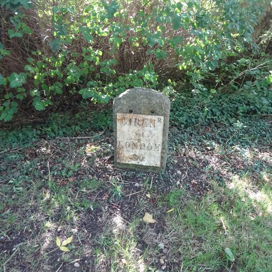 Milestone, E of garage, E of Whelford turning.