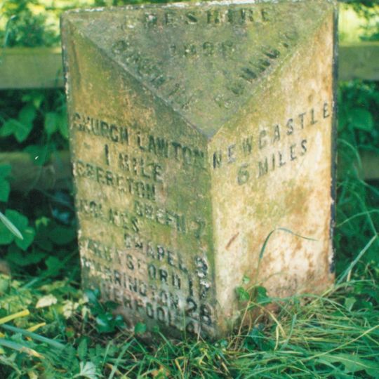 Milepost, entrance to Longstyle Farm