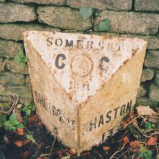 Milepost, London Road, E side of village
