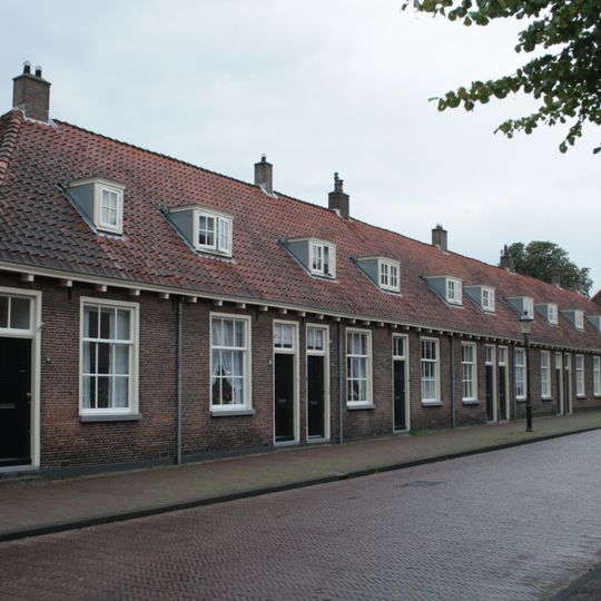 Armen de Poth: Groep van zeven woningen