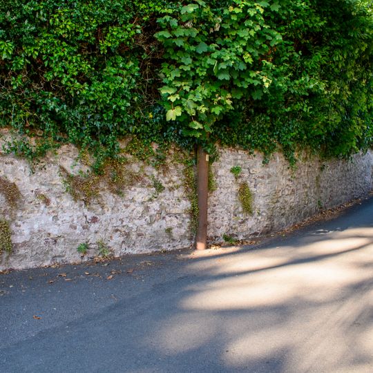 Garden Wall And Doorway To The Cottage