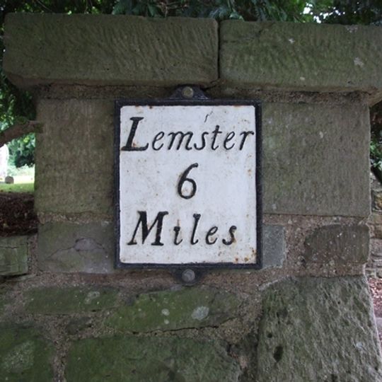 Milestone, by N entrance to churchyard