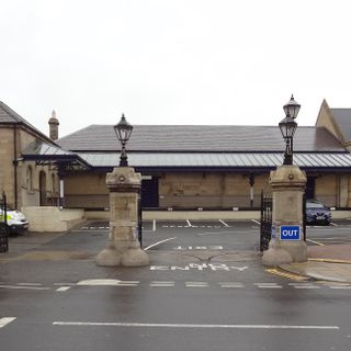 Gates, Gatepiers And Boundary/Retaining Walls To Railway Station Forecourt, Including Commercial Premises