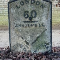 Milepost, Bury Road, at jct with A1506 opposide Bury Side Depot