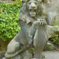 Two lions with coat of arms