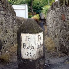 Milestone, by No. 126 Summerhill Road, St George