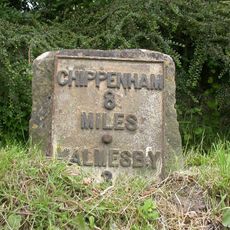 Milestone, The Hill; 50m E The Saladin in front of Apple Tree House