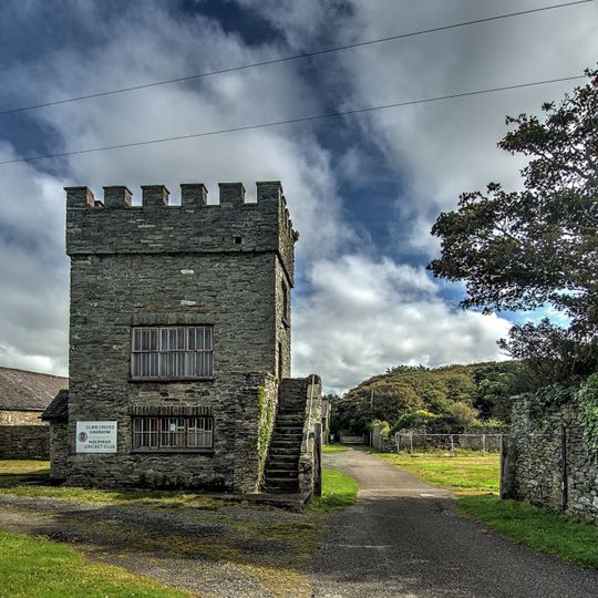 Baillifs Tower and with boundary wall, gates and attached outbuildings at Penrhos Home Farm