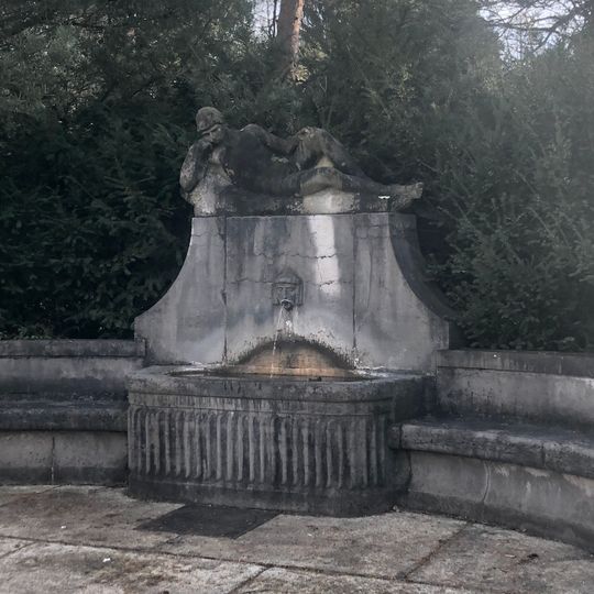 Fountain with Male Sculpture and Bench