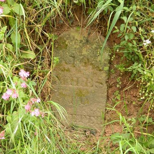 Milestone, 30m S of Sturridge & Hare House, 600m N of Orchard Close