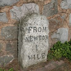 Milestone, above Penn Inn roundabout, Shaldon Road, 10m from traffic lights at Queensway jct
