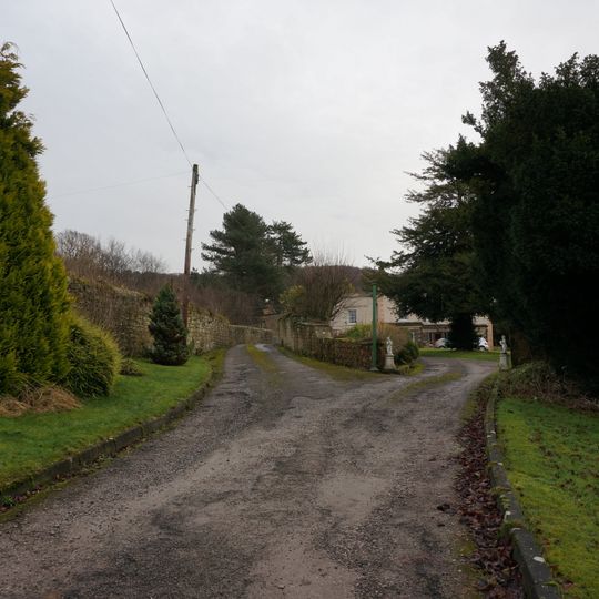 Entrance gateway and attached garden wall at The Brooklands