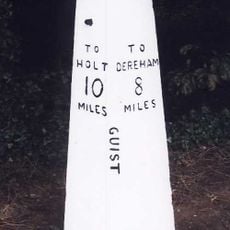 Milestone, opp. 4th house N of jct with A1067
