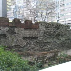 London Wall: section of Roman and medieval wall at St Alphage Garden, incorporating remains of St Alphage's Church