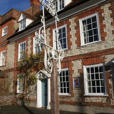 Inn sign approximately 2 metres to South West of numbers 15 and 17 (The Castle Inn Public House)
